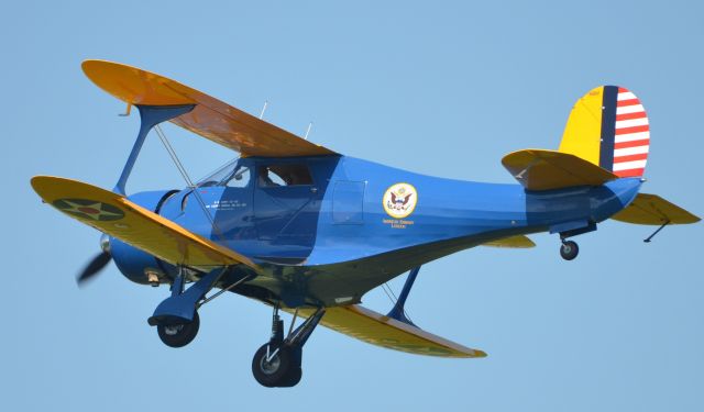 Beechcraft Staggerwing (N16M) - Final approach to runway 36 at Airventure 2018.