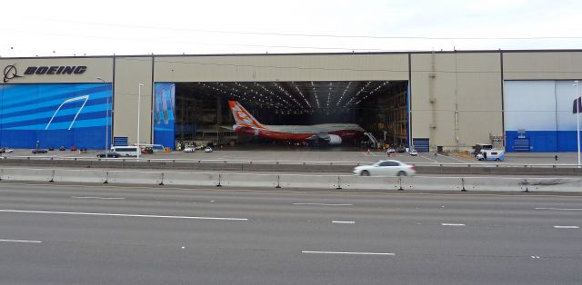 N6067E — - ROLL OUT SERIES #1:  Boeing 747-8 Intercontinental RC001 Business Jet for undisclosed government  customer about to be pushed out of Boeing Assembly Plant hangar on 2-13-2011 roll-out day at Paine Field, Everett, Washington  ||||   Photo by Bruce McKinnon