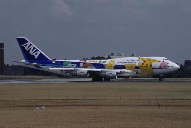 Boeing 747-400 (JA8962) - Departure at Narita Intl Airport Rwy16R on 1999/04/01 " Inter Pokemon c/s "