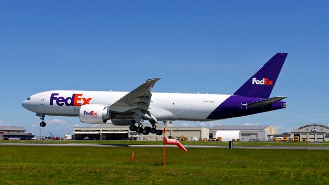 Boeing 777-200 (N860FD) - BOE237 on short final to Rwy 34L to complete a C1 flight on 5.7.19. (B777-FS2 / ln 1601 / cn 37731).