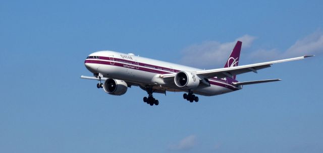 BOEING 777-300ER (A7-BAC) - About to touch down is this 2008 Qatar Airways Boeing 777-3DZ (ER) sporting the 25th Anniversary Retro Livery in the Autumn of 2023.