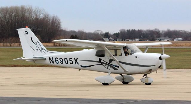 Cessna 175 Skylark (N6905X) - Whiteside County Airport 09 Dec 2021br /This home-based Cessna 175B is being taxied by my friend Jonah just before he goes up for some duel flight instruction.  br /Gary C. Orlando Photo