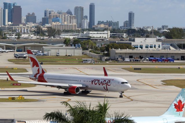 BOEING 767-300 (C-FMLZ) - Air Canada Rouge (RV) C-FMLZ B767-316 ER [cn27597]br /Fort Lauderdale (FLL). Air Canada Rouge flight RV1620 taxis to the gate after arriving from Toronto Pearson (YYZ).br /Taken from Terminal 1 car park roof level br /2018 04 07br /a rel=nofollow href=http://alphayankee.smugmug.com/Airlines-and-Airliners-Portfolio/Airlines/AmericasAirlines/Air-Canada-Rouge-RVhttps://alphayankee.smugmug.com/Airlines-and-Airliners-Portfolio/Airlines/AmericasAirlines/Air-Canada-Rouge-RV/a