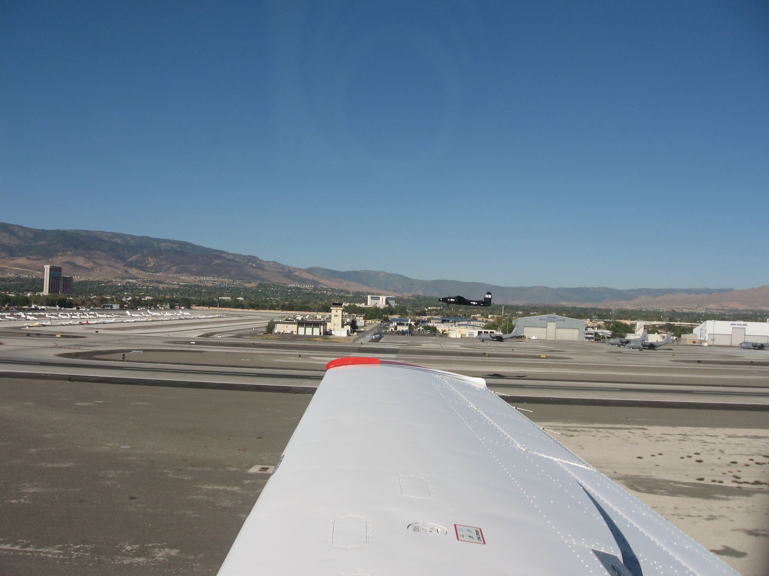 Mooney M-20 (N1029M) - parallel takeoff w A26 at Reno after air races 2007