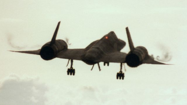 Lockheed Blackbird (N17972) - SR-71A s/n 17972 landing RAF Mildenhall, UK.  High humidity made the vortices visible.  Shot from the A1101 (Field Rd) off the approach end of runway 29.