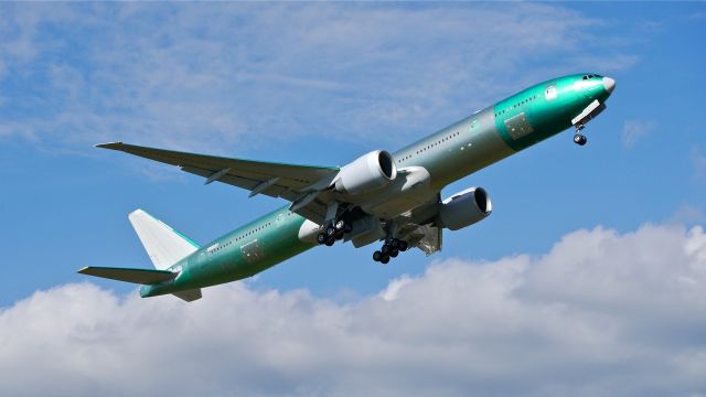 BOEING 777-300 (N730AN) - BOE314 makes a missed approach to Rwy 16R during its maiden flight test on 6/18/14. (LN:1217 / cn 31554).