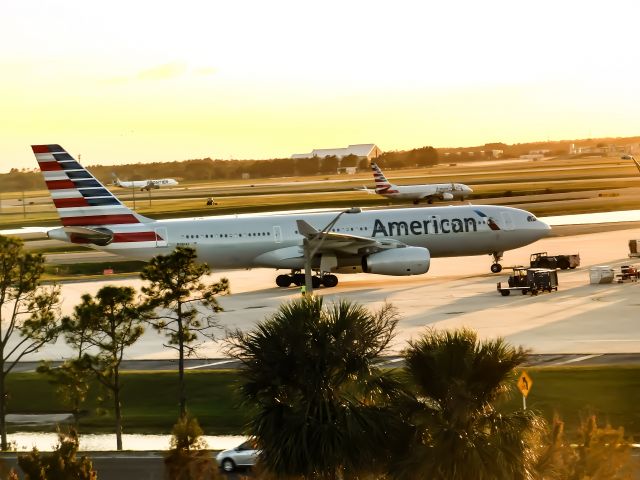 Airbus A330-300 (N281AY) - Parking garage, pushback A330 at MCO to go to Charlotte on the seasonal aircraft for this Christmas 