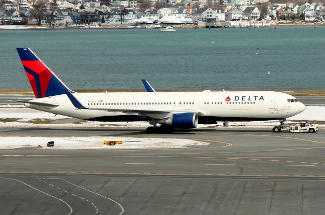 BOEING 767-300 (N16065) - DL 59 from London being towed from the International Terminal