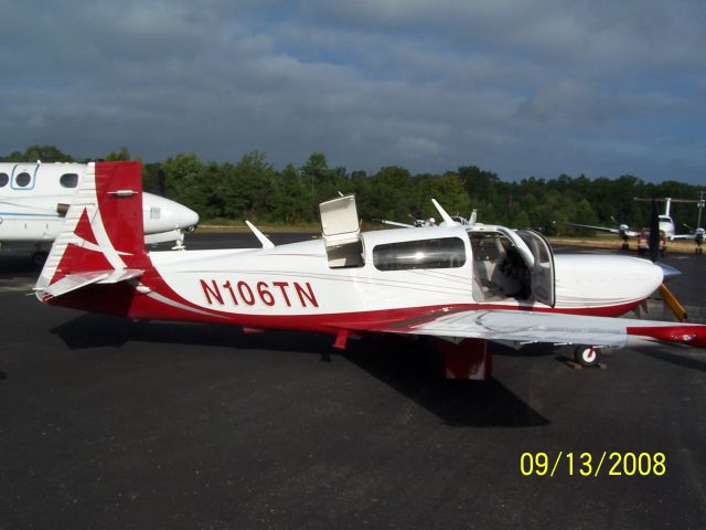 Mooney M-20 Turbo (N106TN) - I came across this slick Mooney at the Scott County Oneida Airshow. Very nice. 