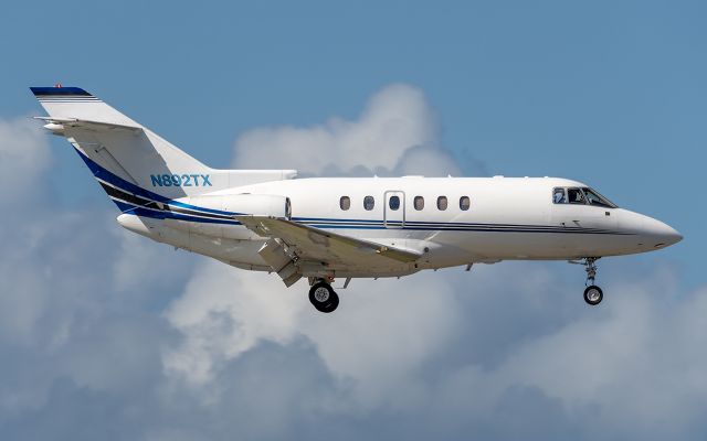 Hawker 800 (N892TX) - High approach into Princess Juliana International on 24/Feb/2024