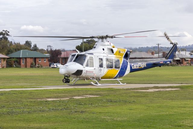 Bell 412 (VH-LWI) - CareFlight (VH-LWI) Bell 412EP at the Duke of Kent Oval (YXWG) helipad.