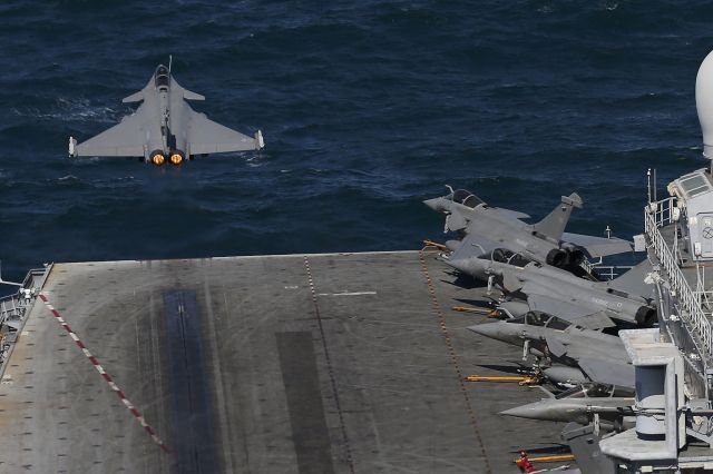 — — - A Rafale fighter jet is catapulted from the flight deck as it leaves on a mission aboard Frances Charles de Gaulle Aircraft carrier in the Gulf, January 28, 2016. (Photo by Philippe Wojazer/Reuters)