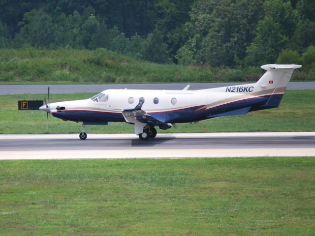 Pilatus PC-12 (N216KC) - Arriving on runway 20 KJQF - 7/28/09