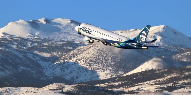 EMBRAER 175 (long wing) (N620QX) - The LAX-bound passengers on the right side of QXE's N620QX are just about to get a super sunrise view of Mt. Rose as the Horizon Embraer climbs away from 16R.