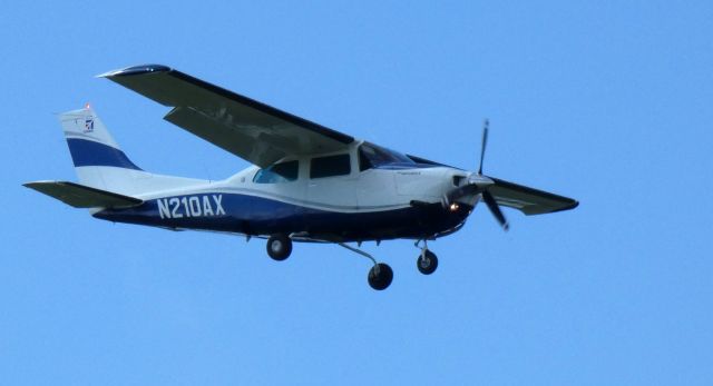 Cessna Centurion (N210AX) - On final is this 1979 Cessna Centurion II T201N in the Summer of 2020.