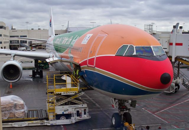 Airbus A340-600 (B-6055) - China Eastern A340-642 B-6055 wearing the "Shanghai Expo 2010" livery at the TBIT at LAX on Oct 18, 2012.