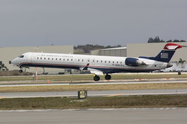 Canadair Regional Jet CRJ-900 (N907FJ) - Mesa/US Airways Flight 2607 (N907FJ) arrives on Runway 32 at Sarasota-Bradenton International Airport following a flight from Charlotte-Douglas International Airport