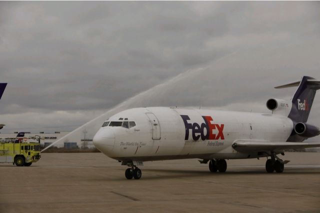 BOEING 727-200 (N268FE) - N268FE gets a water cannon salute upon her arrival at Buffalo Niagara Intl Airport after the 39,448th and final flight of her 33-year career. Delivered new to Air Canada in 1979, she spent the final 19 years of her service hauling freight for FedEx. She will now be used as a static training aid for ARFF crews and local law enforcement agencies.