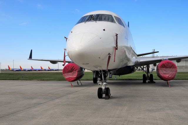 Embraer 170/175 (N808MD) - With some of the SWA parked and stored fleet in the background.