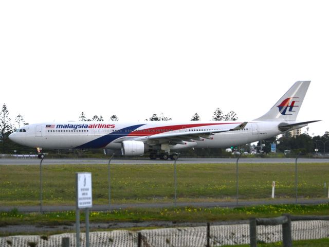 Airbus A330-300 (9M-MTC) - Turning on to runway 05, for take off for flight home to Kuala Lumpur, just before the arrival of a rain storm. Thursday 12th July 2012.