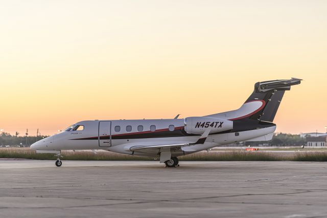Embraer Phenom 300 (N454TX) - Photo Credit: Chris Spicks