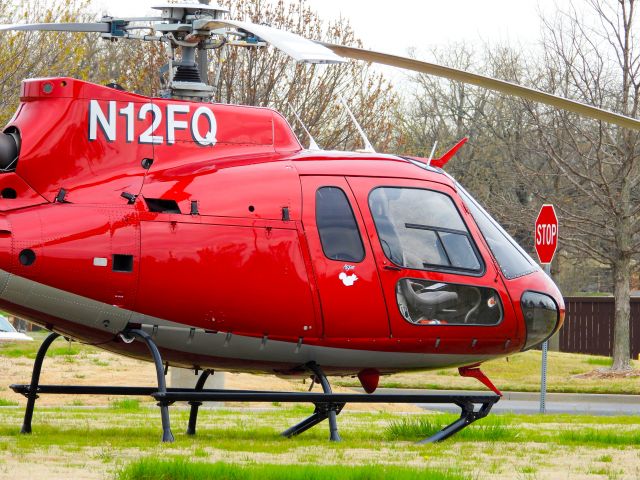 Eurocopter AS-350 AStar (N12FQ) - Always stop at stop signs. lol! Parked at Downstream Casino Resort in Baxter Springs, KS, Joplin, MO, And Quapaw, OK. Yes located in 3 states. 