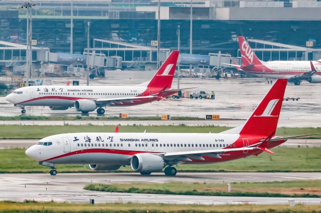 Boeing 737-700 (B-1149) - Two max8s taxing in parallel for take off.