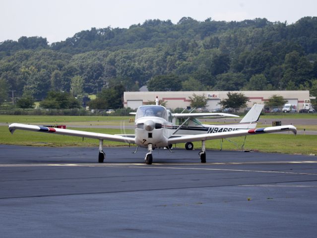 Beechcraft Sundowner (N9775L) - Taxiing out of the Executive Air ramp.