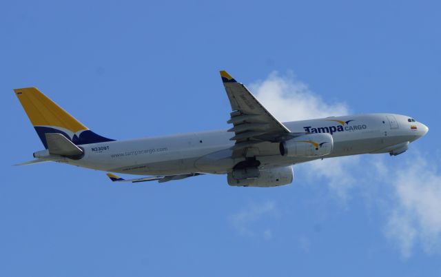 Airbus A330-200 (N330QT) - Leaving KMIA into the morning sun. Now Avianca Cargo.