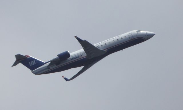 Canadair Regional Jet CRJ-200 (N450AW) - Shown here a moment from departure is an US Airways Express Canadair Regional Jet in the Summer of 2016.