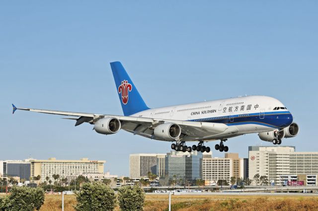 B-6138 — - A China Southern Airlines operated Airbus A380-841 super jumbo on final approach to the Los Angeles International Airport, LAX, in Westchester, Los Angeles, California. In the background, airport hotels along Century Boulevard