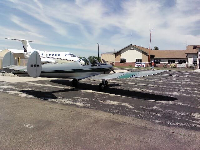 — — - Ksue ~ A very nice Aircoupe visiting Sturgeon Bay. Home base is on the owners farm in Rio Creek, Wisconsin. 