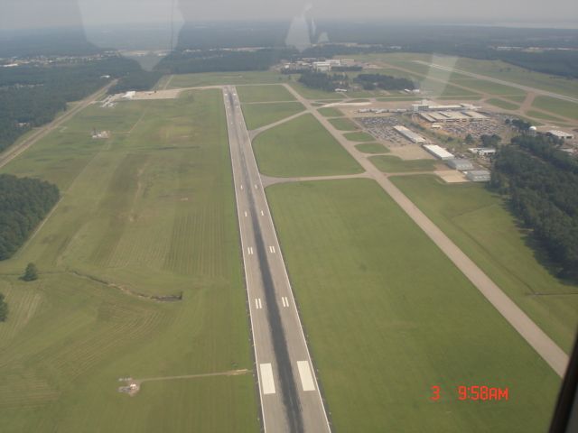 Piper Saratoga (N30082) - Left Cross wind at OSA landing at Mount Pleasant, TX Airport on our way to Roswell New Mexico 2006.