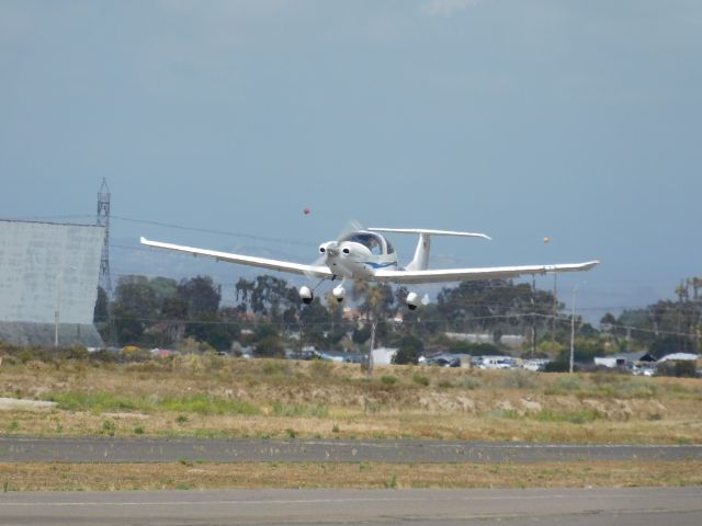 Beechcraft Beechjet (N138DS) - I was standing near the Skydiving Facility on Sunday, May 17, 2015 and took some photos on my Nikon L840 camera.