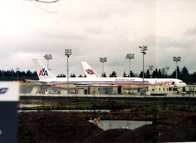 BOEING 767-300 (N380AN) - KPAE N380AN 25449/489 - a crummy but interesting photo - April 1993 at Everett - a few people have seen this photo and said the Air Leisure never took delivery of this jet behind the American 767. I have searched some records on the Internet and have not found any notes that Air Leisure did in fact take this new 763.