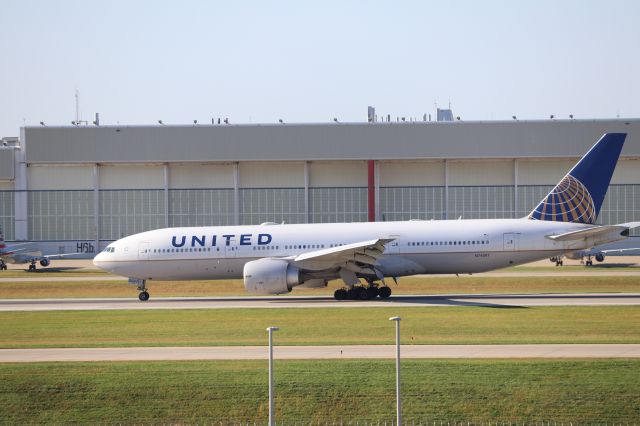 BOEING 777-200LR (N74007) - United 777 in old colors. NFL Charter.