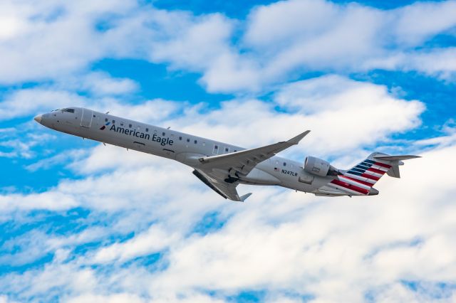 Canadair Regional Jet CRJ-900 (N247LR) - Mesa Airlines CRJ900 taking off from PHX on 12/7/22. Taken with a Canon R7 and Tamron 70-200 G2 lens.