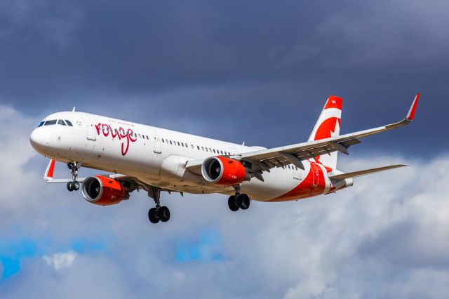 Airbus A321 (C-FJOU) - An Air Canada Rouge A321 landing at PHX on 2/26/23. Taken with a Canon R7 and Tamron 70-200 G2 lens.