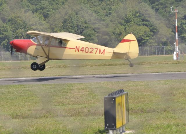 N4027M — - Photo taken a fence line, fence link show up but fair landing shot.