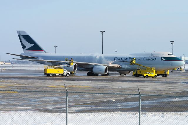 Boeing 747-200 (B-LJF) - De-icing procedure at Toronto (CYYZ) airport.