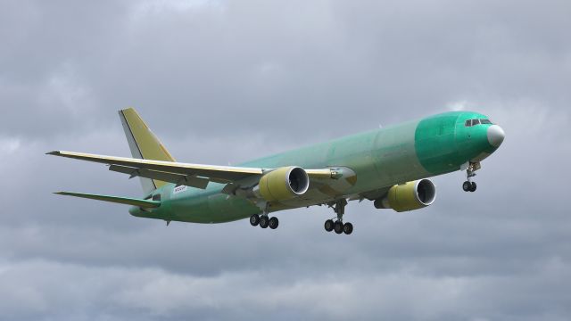 BOEING 767-300 (N352UP) - BOE283 (LN:1028) flies a missed approach to runway 16R during its maiden flight on 4/30/12.