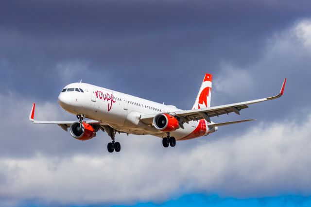 Airbus A321 (C-FJOU) - An Air Canada Rouge A321 landing at PHX on 2/26/23. Taken with a Canon R7 and Tamron 70-200 G2 lens.