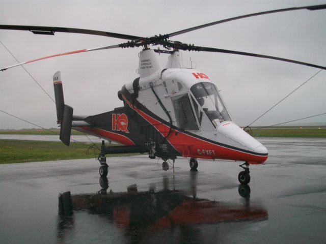 C-FXFT — - Kaman K-1200 waiting for a weather break to depart with a sling load. June 22, 2011.