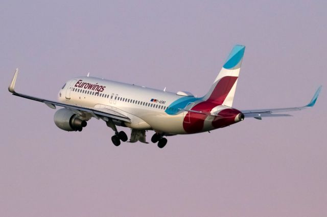 Airbus A320 (D-AEWO) - EWG9341 climbing in to the morning's pink sky on the way back to Dusseldorf