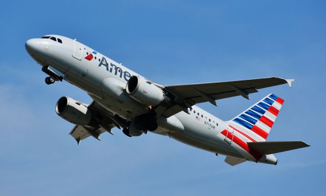 Airbus A319 (N717UW) - The former Carolina Panthers bird, taken from the CLT overlook, 6/29/19.