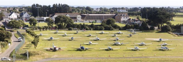 — — - Aircraft outside Jersey Aero Club UK, this image taken on Canon DS5 24-70 2.8 from cabin of Cessna Citation CJ4 inbound to EGJJ from EGHI