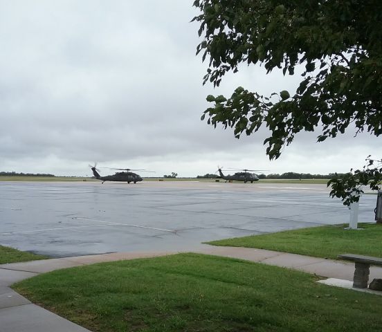 — — - Two Blackhawks departing.