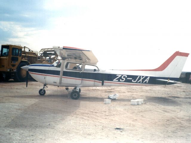 ZS-JXA — - At a gypsum mine near Loerisfontein, South Africa. It is a C172XP, 195HP.