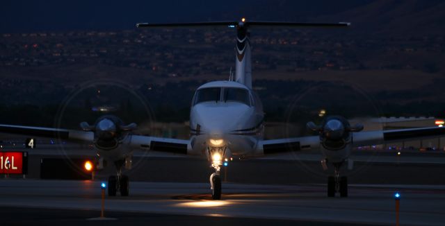 Beechcraft Super King Air 200 (N204JS) - Reno Flying Service's Beechcraft King Air N204JS is captured turning from Juliet to Charlie after completing a "before sunrise" (5:16 AM - 5:57 AM) flight from San Jose (KSJC).br /br /This photo of N204JS is the first picture of it to be posted into FA's gallery.