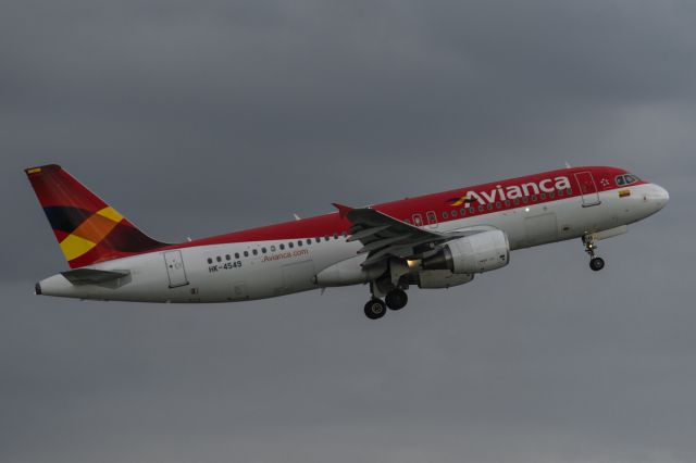 Airbus A320 (HK-4549) - Avianca departing KMCO under light precipitation and a lowering ceiling during a nasty central Florida storm. 